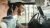 Couple laughing while driving a car