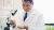 Chemist with microscope